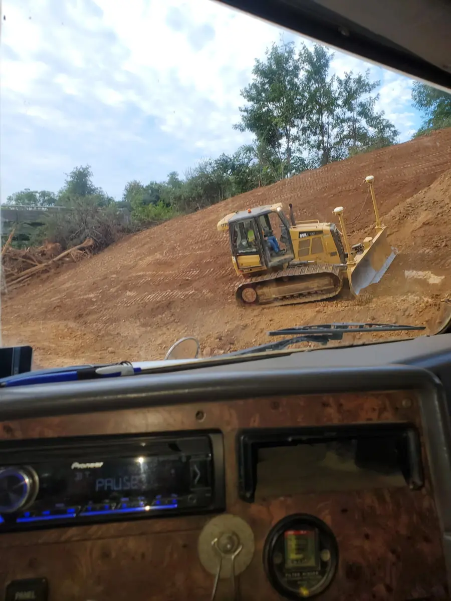 CAT D5K dozer grading a hillside