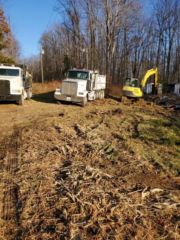 Brooks Hauling truck and excavator fleet