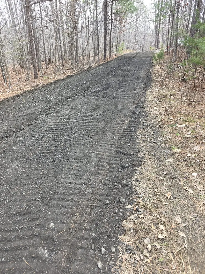 Roller tracks on a freshly compacted gravel road